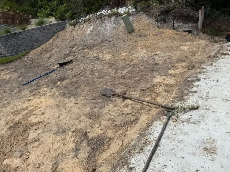 Yard cleared and graded before sod installation